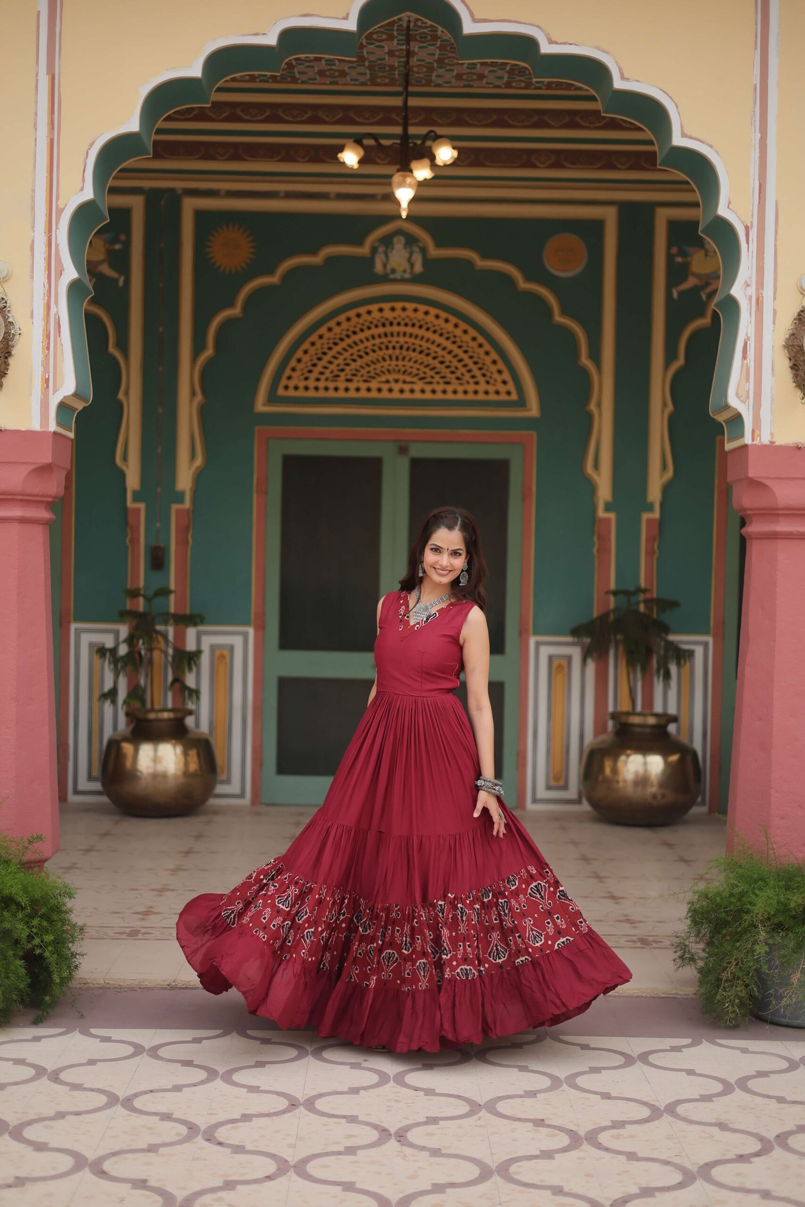 Maroon Designer Heavy Reyon Gown with Printed Frill & Fancy V-Neck - Image 2